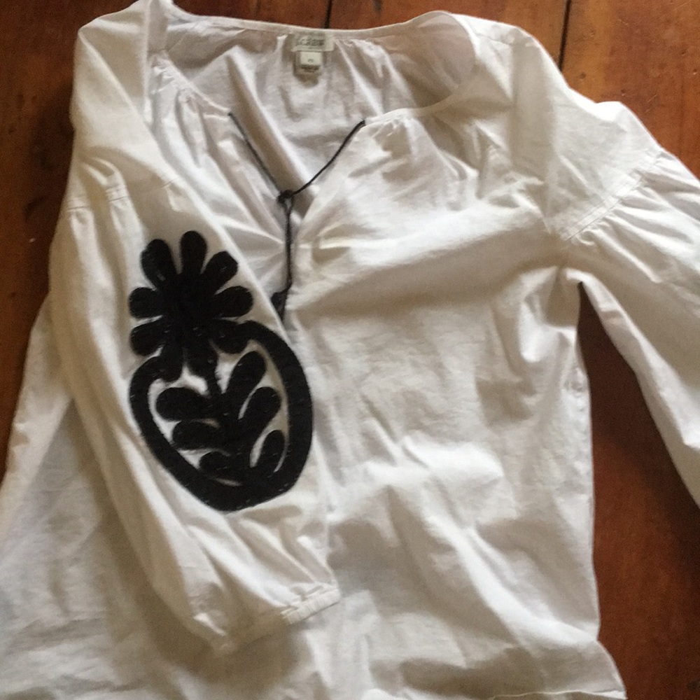 White shirt with embroidered elbows